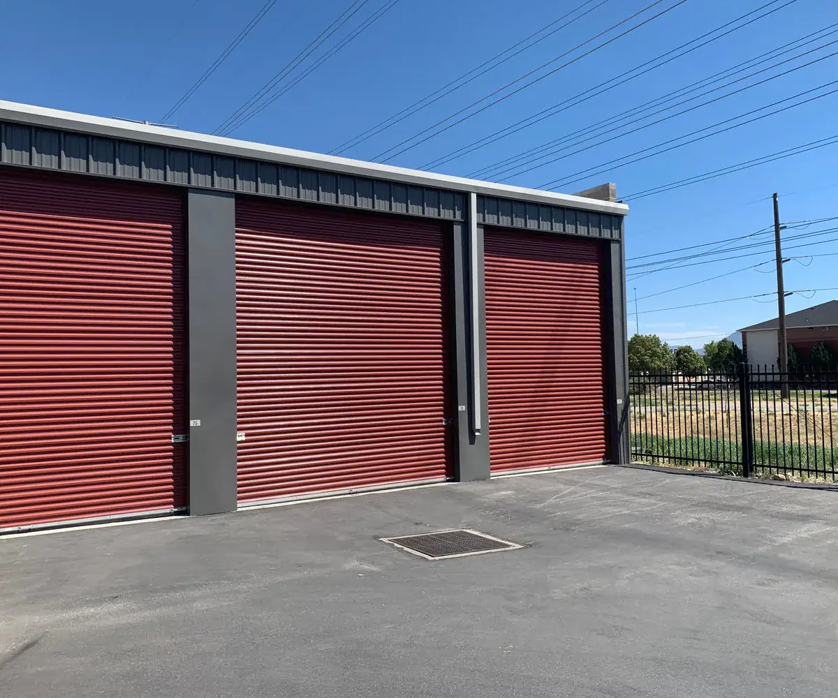 Finished small pre-engineered metal building with metal-panel walls and drive-in bays