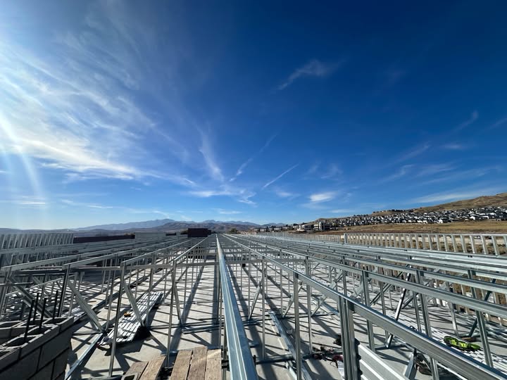 Steel trusses with mountain sky
